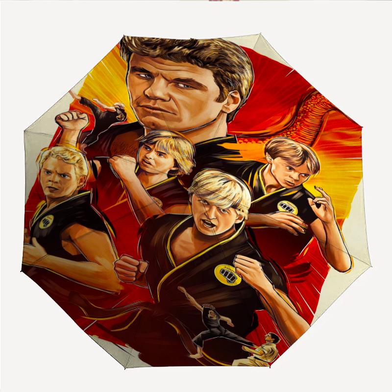 Cobra Kai Fashionable Automatic Opening/Closing Folding Umbrella. Portable and Foldable, Ideal for Gift, Travel, and Daily Use.