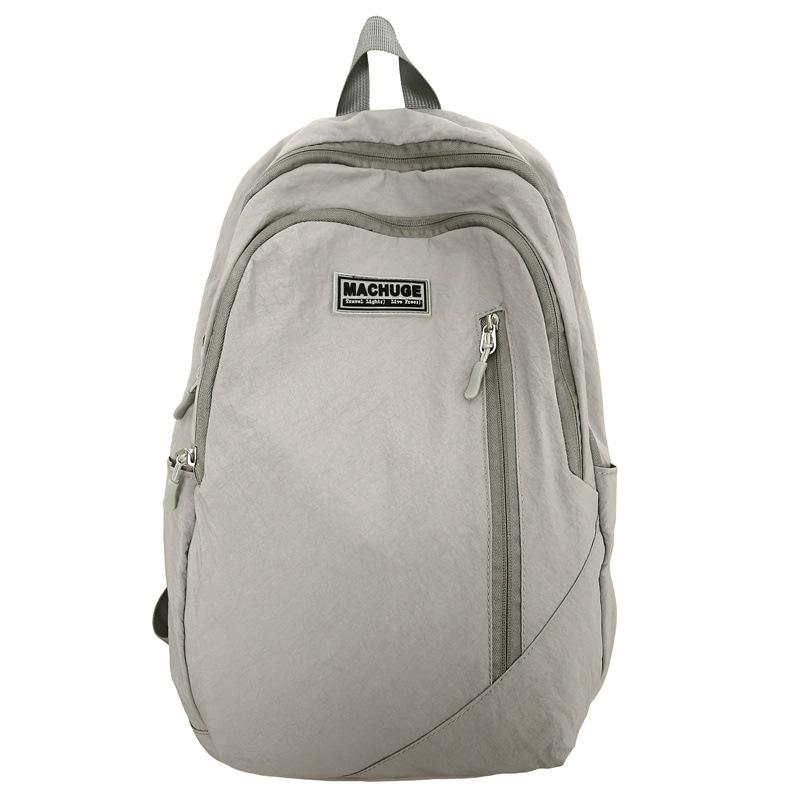 Schoolbag Japanese Simple Casual Backpack Women's Large Capacity Travel Backpack Versatile Student Light Commuter Bag Men's School Bag Tide