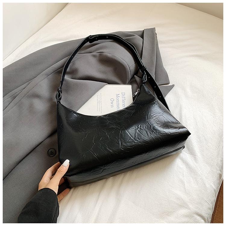 

Сумка высокой ценности женская 2025 новая трендовая на одно плечо сумка-подмышка нишевая простая для通勤 сумка-мессенджер сумка-пельмень