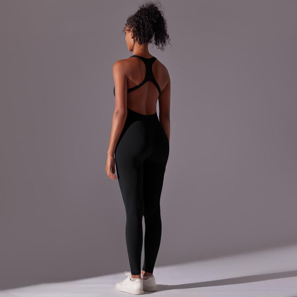 Sömlös enfärgad yogajumpsuit med öppen rygg
