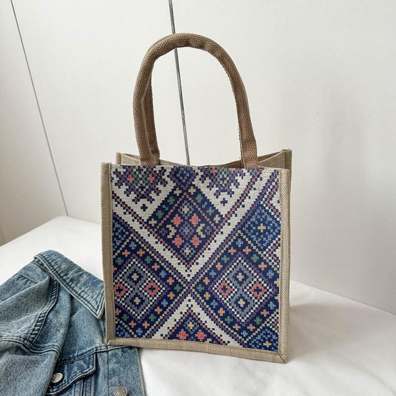 

Stylish Casual Tote Bag For Women Featuring Unique Rabbit And Ethnic Patterns In Black And Blue Ethnic Blue