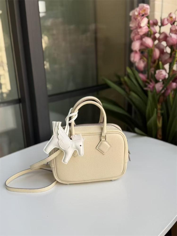 2025 New Genuine Leather Women's Bag Head Layer Leather Plumes Soft Leather Feather Bag Handheld Diagonal Cross Border Women's Bag