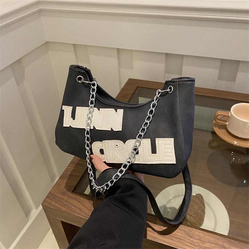 

2024 Women s Casual Large Capacity Soft Handbag with Embroidered Letters and Chain - New Summer Fashion Crossbody Bag. синій