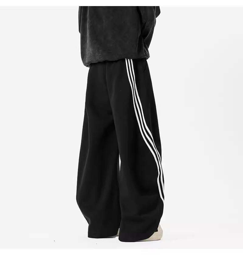 Pánské tmavě modré široké tepláky se třemi pruhy - Ležérní jarní high street trend