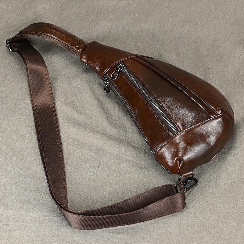 Creative fashion breast bag men's leather shoulder bag messenger bag first layer cowhide retro men's bag