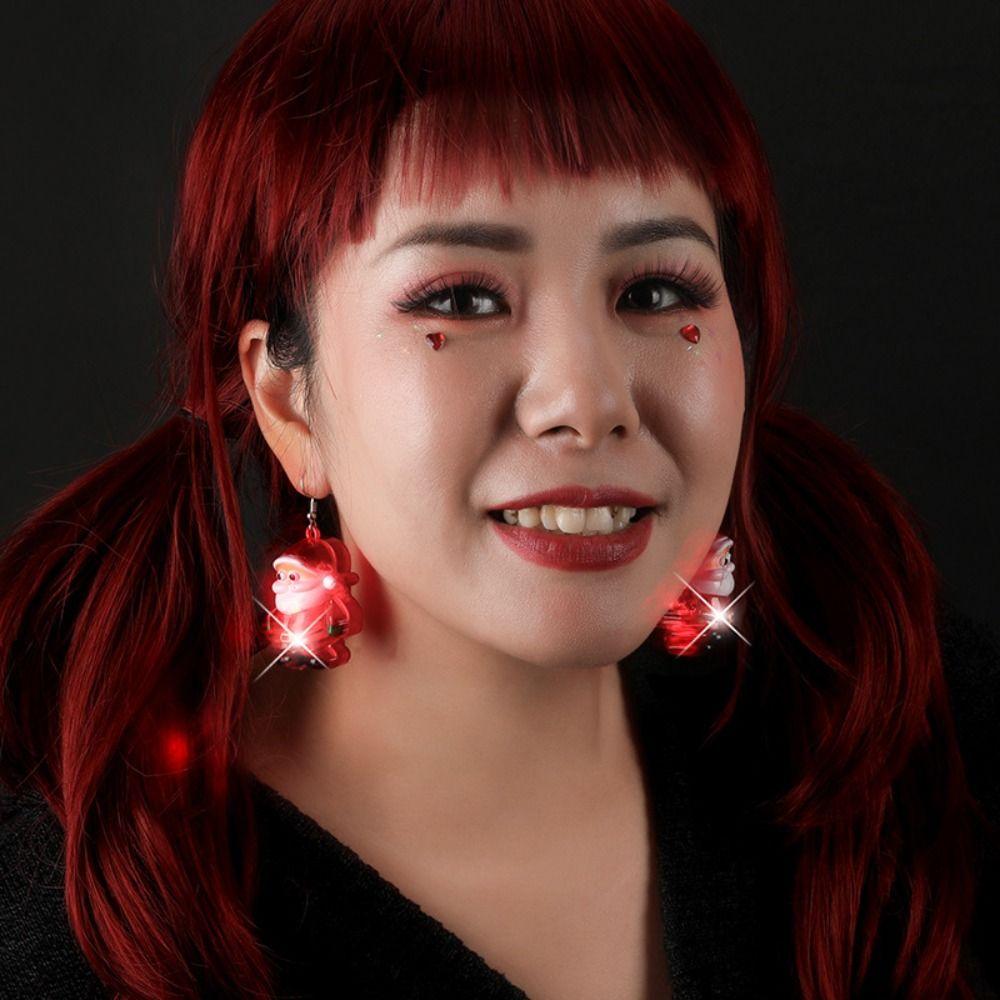 Elektrische baumelnde Weihnachts-Ohrclips Weihnachtsmann leuchtende baumelnde Weihnachts-Ohrringe LED-Hängeohrringe Neujahr