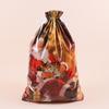 Christmas Drawstring Gift Bags with Assorted Festive Patterns Self Standing for Home Xmas Party Treat Packing
