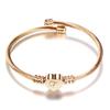 Stylish Women's Bracelet: Stainless Steel Peach Heart with Braided Cable and European-American 26 Letters Design