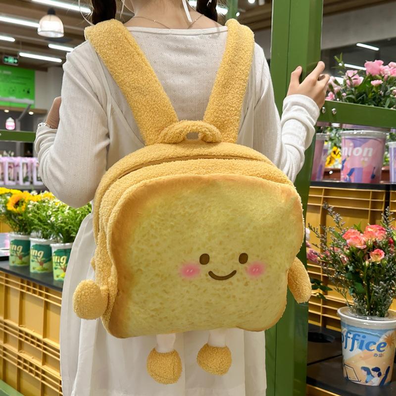 

Cartoon plush butter toast backpack student schoolbag cute funny bread large capacity backpack women s gift
