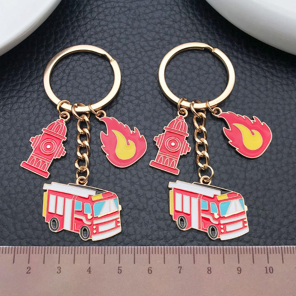 Fire Safety Commemorative Keychain Pendant: Drip Oil Flame, Hydrant & Fire Truck Design