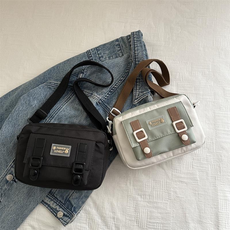 Cute canvas oblique span bag female niche vitality girl small fresh youth simple