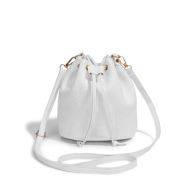 New women's drawstring bucket bag, fashionable commuter bag, trendy shoulder bag, one piece.