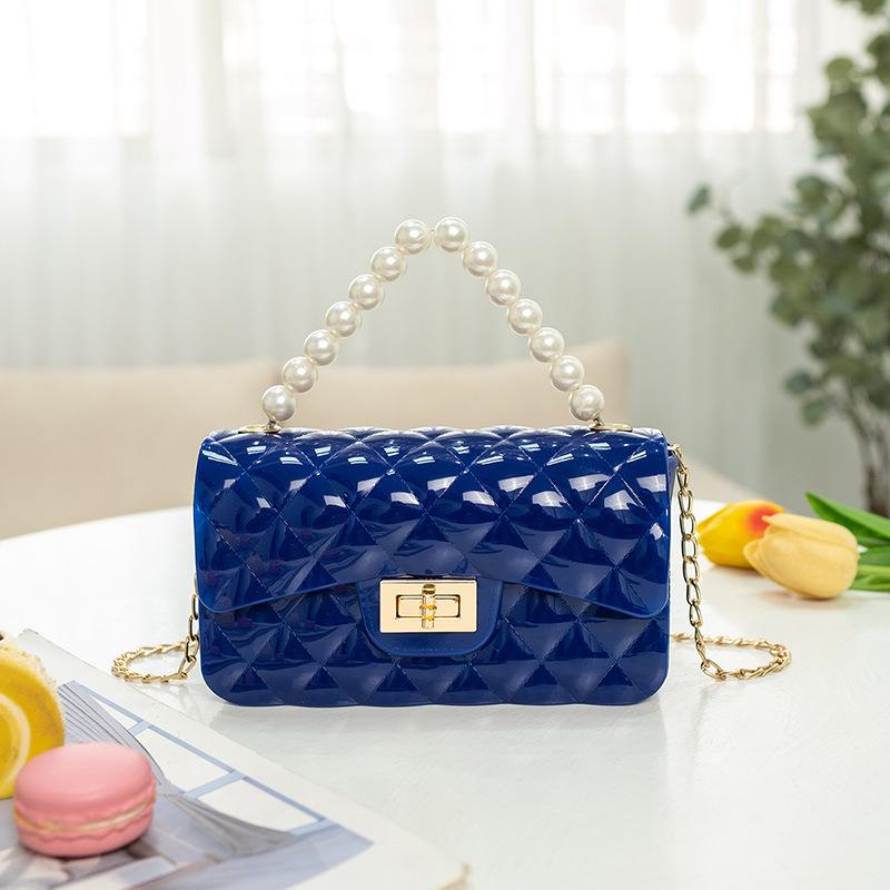 Fashion pearl shoulder jelly bag, women's versatile diamond lipstick change bag, one piece.