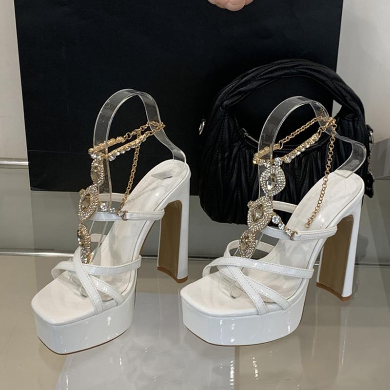 

Модная обувь Liyke Подиумная мода Цепочка со стразами Ремешок на щиколотке Золотые сандалии Женские Элегантный квадратный носок Платформа Высокий каблук Свадебная банкетная обувь 35 белый