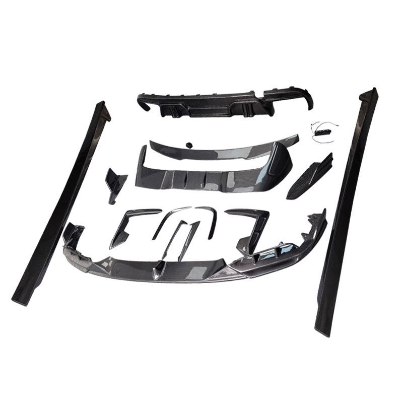 BMW X5M F95 Carbon Fiber Body Kit: Front Lip Splitter, Rear Lip, Side Skirts, Wind Deflectors, Tail Wing with Lights.