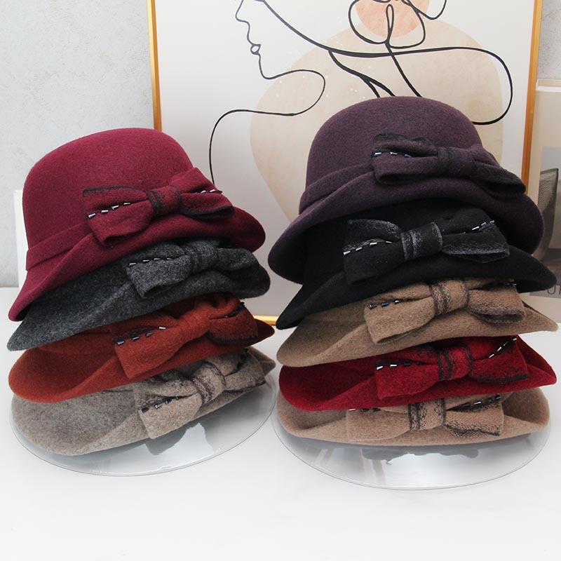 Autumn and winter hat women's thermal basin hat retro round top hat elegant bow fashion wool British fisherman hat