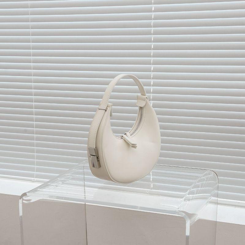 

Сумка-полумесяц в темном стиле 2025: Универсальная женская сумка-полумесяц и сумка через плечо белый