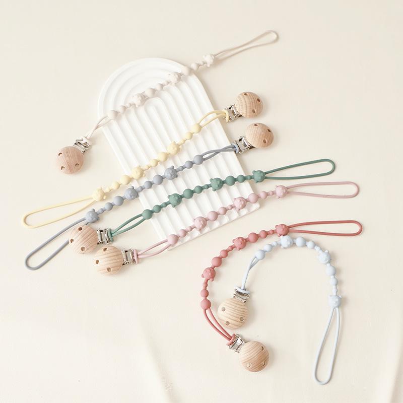 Solid Color Silicone Pacifier Chain Clips Baby Boys Girls Pacifier Gum Chain Bite Music Teeth Grinding Stick Toy Anti Loss Rope