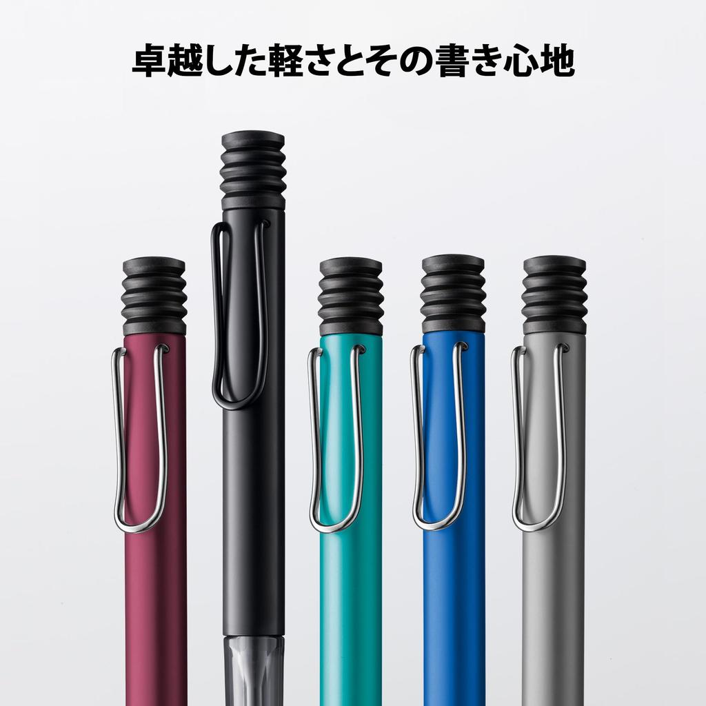 LAMY Ocean Blue Ballpoint Pen Ergonomic Medium Line Width Lightweight Aluminum Body Includes LAMY M 16 Black Refill AL-star - Clear, Grip, - -