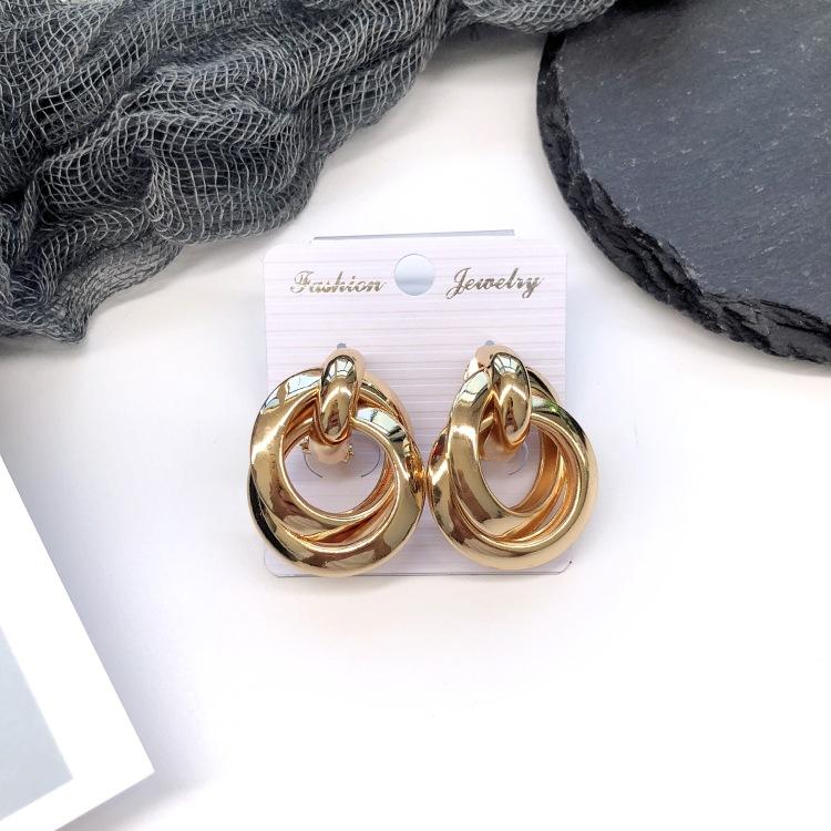 Retro stil personlighet överdrivna metallnitar örhängen enkla geometriska barockstil hoppande örhängen mode öron smycken