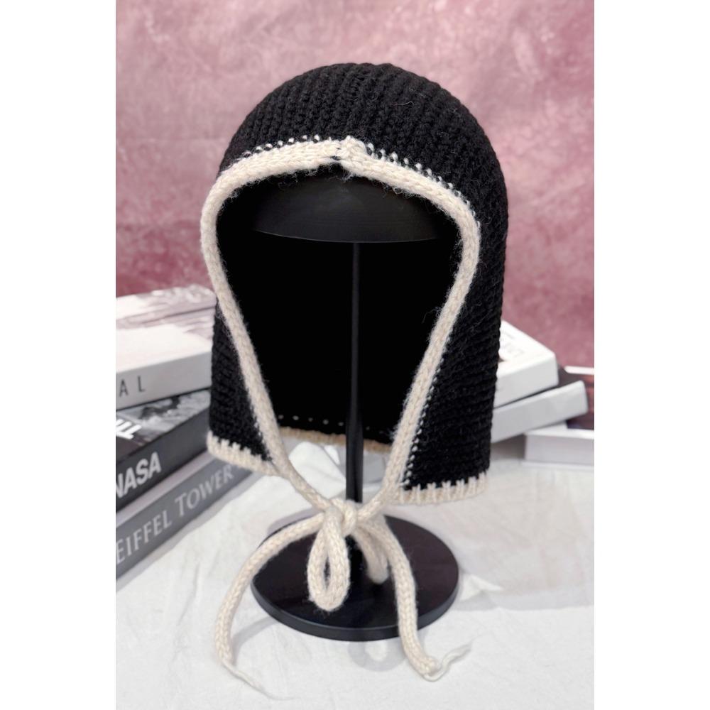 

Hat Korean autumn and winter new fashion wool men s and women s warm and cold-proof contrasting color lace-up Bala kara knitted cold hat чёрный