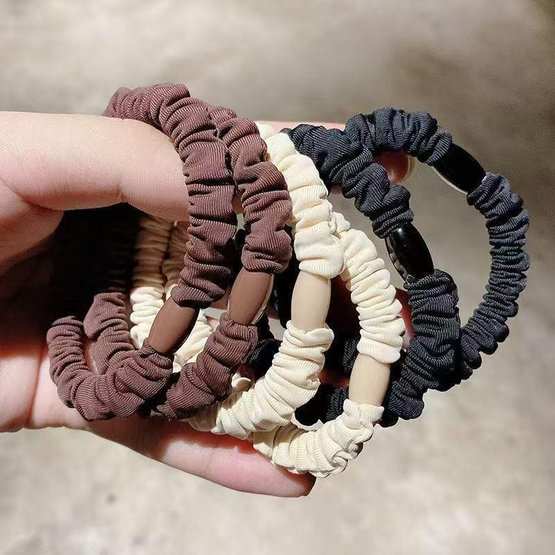 Versatile Black Elastic Hair Tie with Durable Leather Case