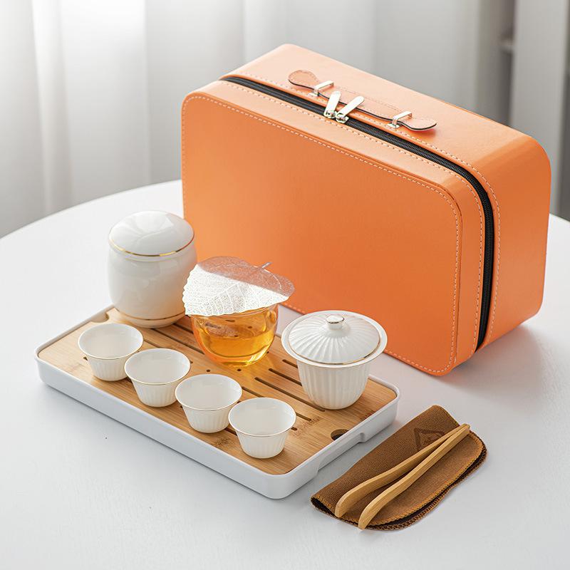 

Suet jade white porcelain travel tea set, whole set, portable bag, side handle pot cover bowl, tea cup, tea tray, business gifts