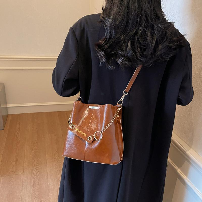 Strukturierte kleine Tasche Damen Frühling Neu Retro Eimer Tasche Mode Nische Design Pendler Umhängetasche
