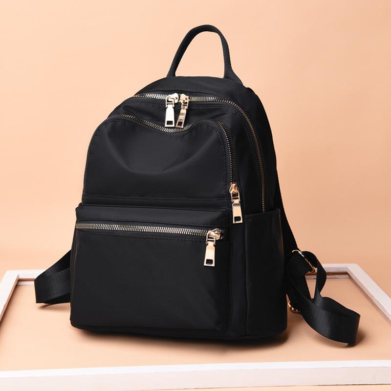 New lightweight Oxford cloth backpack women's Korean version nylon canvas student leisure women's bag travel small backpack