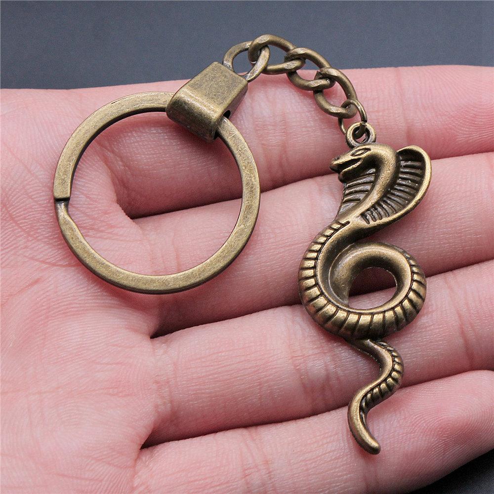 Dinosaur Animal Prehistoric Creature Pendant Antique Bronze Metal Keychain with 30mm Ring for Women High Quality