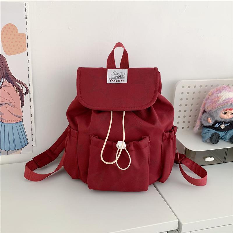 Schoolbag Korean sweet and cool drawstring backpack 1011 new five-pointed star printed schoolbag large capacity versatile cute small backpack