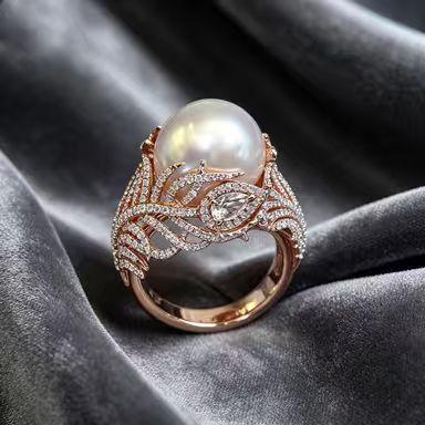 Europe, America, hot-selling new imitation pearl ring feather inlaid zircon ring European beautiful women jewelry