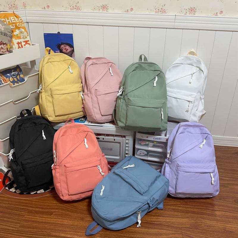 Schoolbag Classic Junior high school schoolbag for women, niche design sense, student backpack for girls, simple casual backpack for men