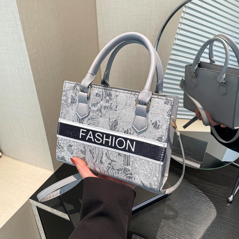 

Fashion commuter large-capacity bag women s new high-end versatile portable tote bag