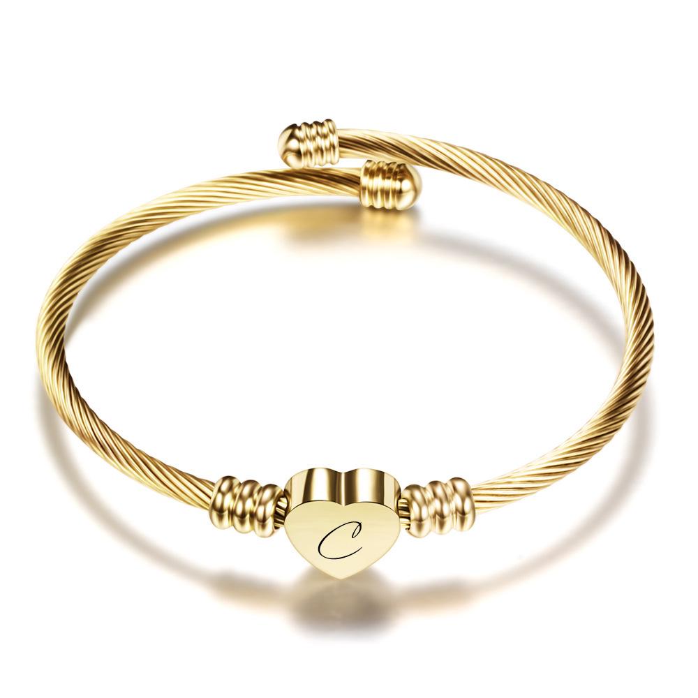 Stylish Women's Bracelet: Stainless Steel Peach Heart with Braided Cable and European-American 26 Letters Design