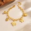 Gold Multi Charm Paperclip Chain Bracelet with Heart Butterfly and Flower