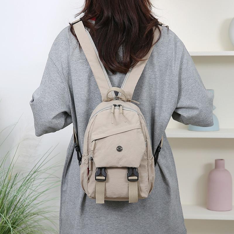 

Модная многофункциональная и вместительная новая простая и универсальная сумка из нейлоновой ткани женский легкий рюкзак сумка через плечо .