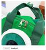 Women's Cute Four-Legged Monster Canvas Backpack - Fashionable, Large Capacity for Travel and School.