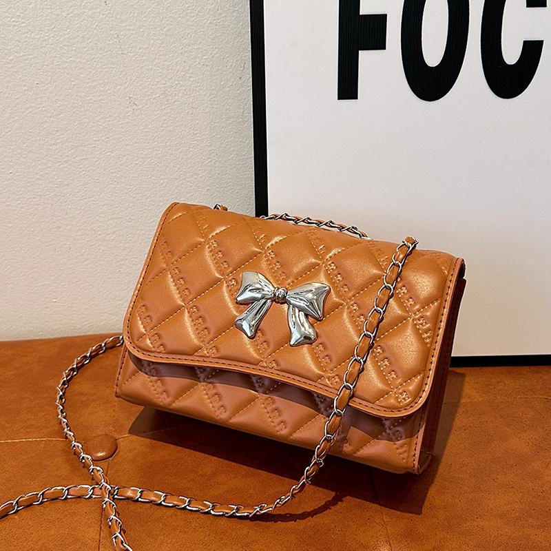 Rhombus casual chain solid color small square bag 2025 autumn new high value foreign style bow shoulder messenger bag