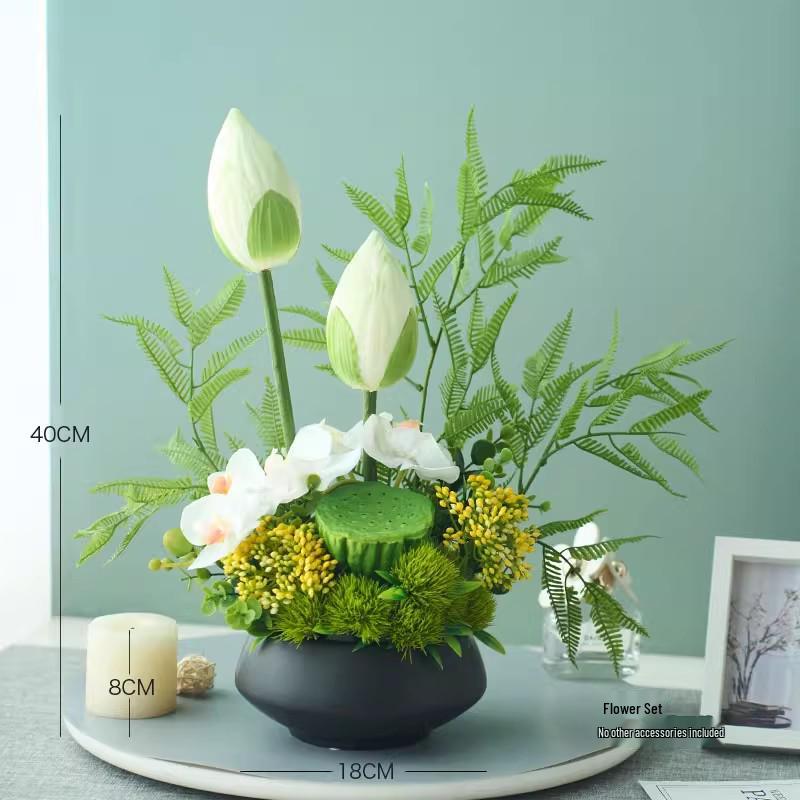 Nordisk modern sommarfräsch inomhuskonstgjord blombukett med gröna krukväxter