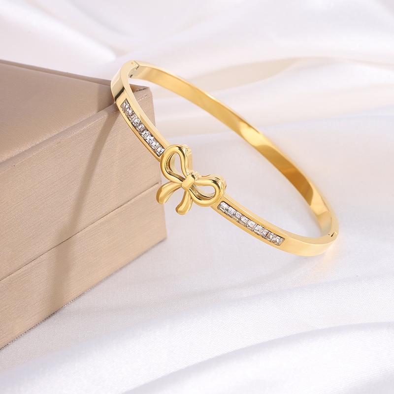 Titanium steel , European and American fashion bow diamond , girls' advanced sense of light luxury, non-fading butterfly