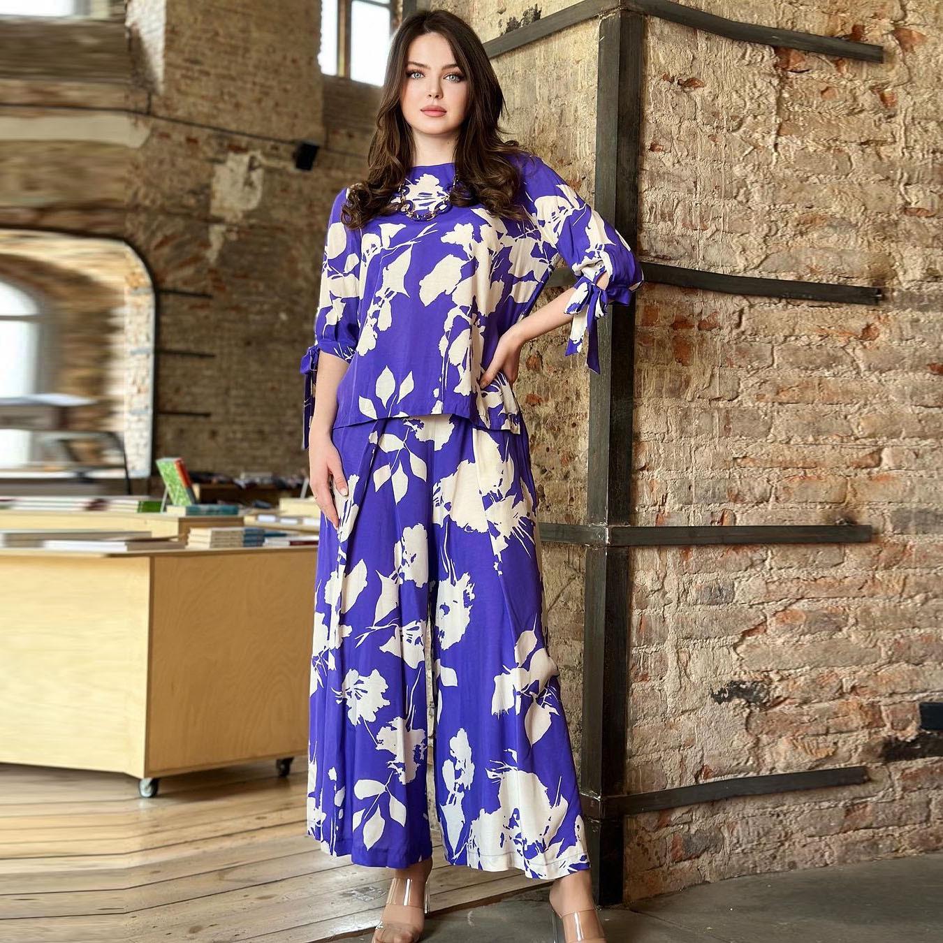 

Весна 2024 Мусульманская женская мода: Комплект из топа на завязках с принтом и брюк широкого кроя Extra Large фиолетовый