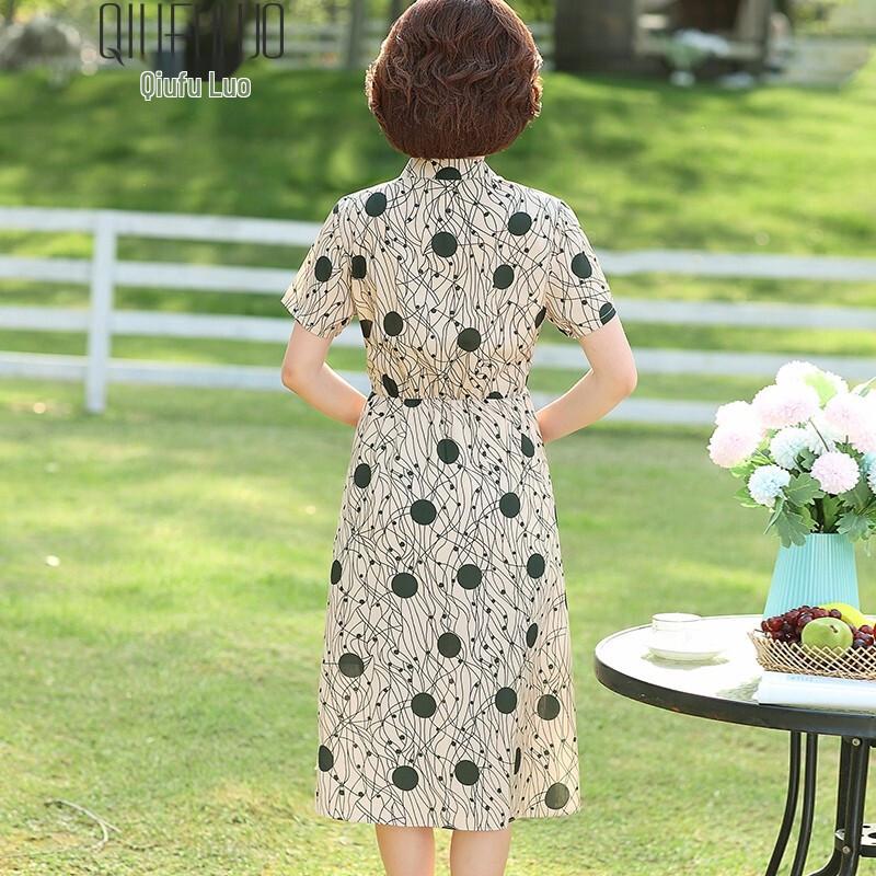 Robe d'été élégante à manches courtes et coupe évasée, à motif floral, pour femmes d'âge moyen