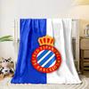 A blue and white striped crest with a red circular border and gold crown. for all seasons blanket lunch break throw gift