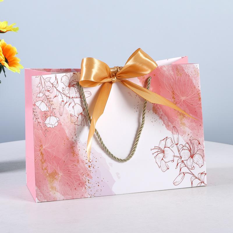 In-Stock White Cardboard Gift Bags with Bow Handle, Customizable Logo for Clothing Stores