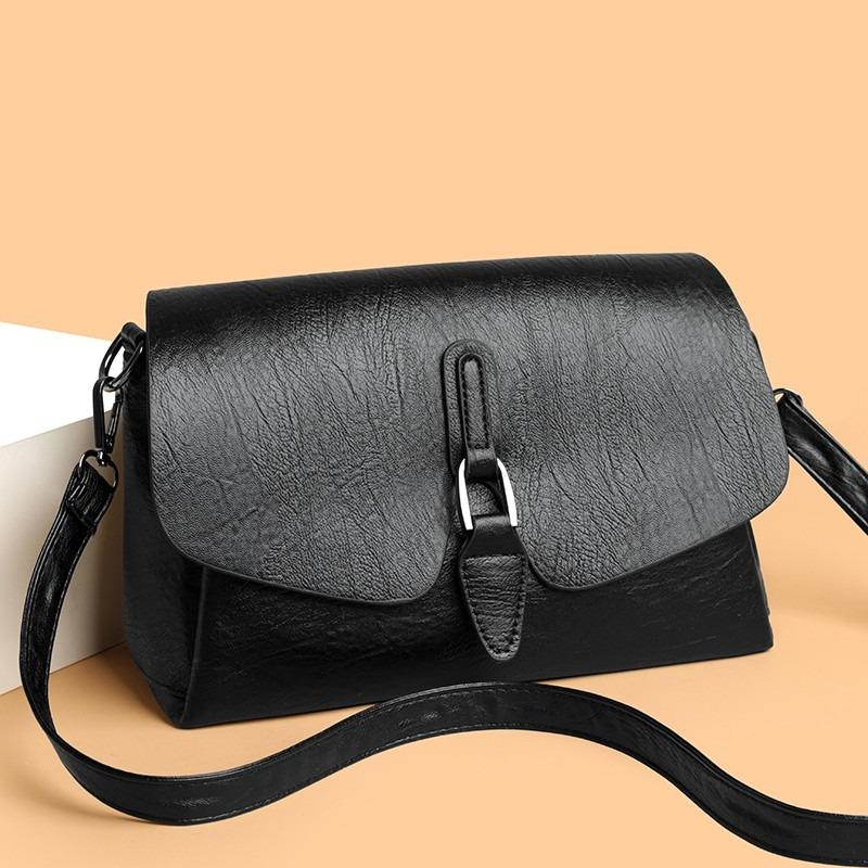 Damen Umhängetasche mit Klappe aus strukturiertem Leder Lässige Schultertasche