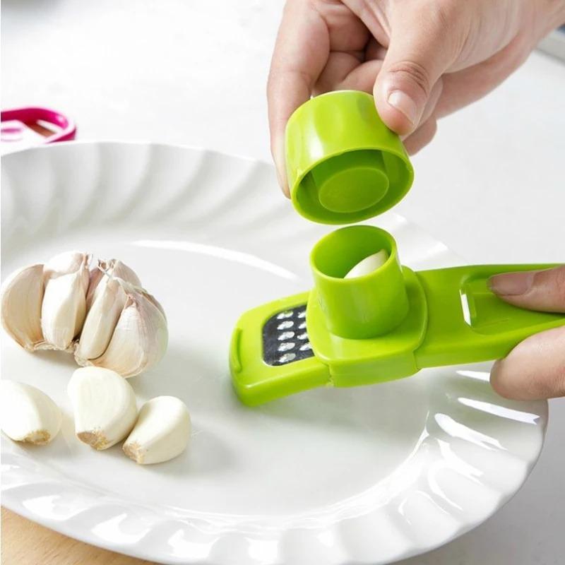 1 balení Mini mlýnek na česnek Creative Lis na česnek Kuchyňská česneková kaše Ruční šťouchání česneku Zelené kuchyňské pomůcky
