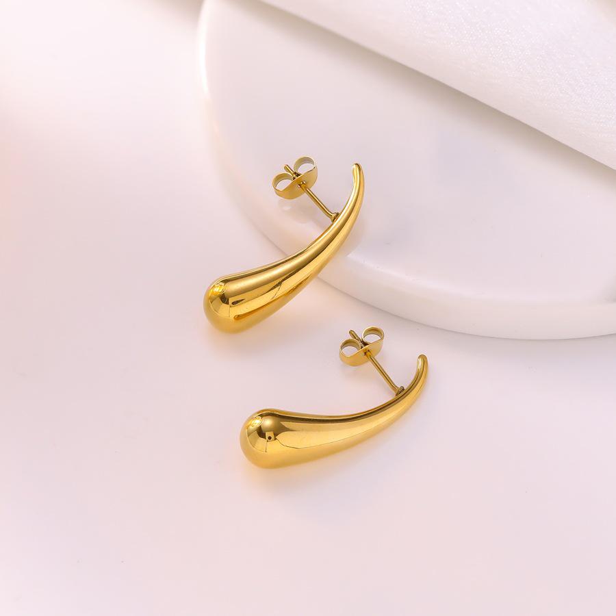 Golden Teardrop Titanium Steel Earrings: Elegant, Light Luxury for Women, Versatile Fashion Statement, Simple and Stylish Ear Cuff.