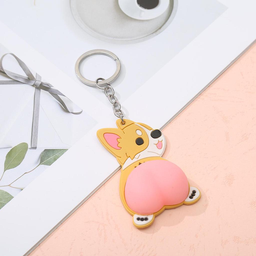 Cartoon Bouncy Butt Keychain - Soft Rubber Squeeze Pendant for Bags & Cars
