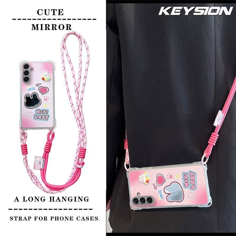 KEYSION Crossbody Strap Phone Case for Samsung A55 5G A35 A25 A15 LTE Cute Cartoon Long Lanyard Mirror Shockproof Cover for Galaxy A05S